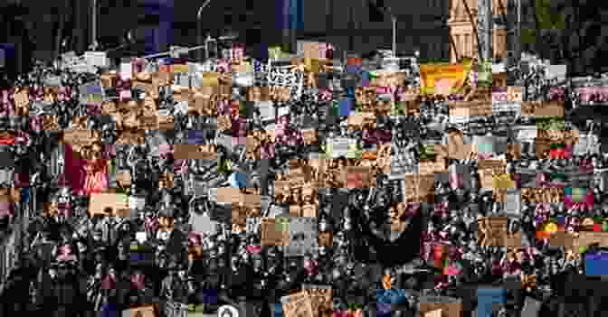 A Group Of Protesters March Against Police Brutality, Holding Signs That Read How The Word Is Passed: A Reckoning With The History Of Slavery Across America