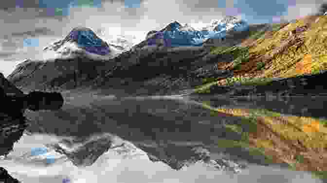 A Serene View Of A Mountain Lake In Tibet, Its Glassy Surface Reflecting The Surrounding Mountains And A Clear Blue Sky. To A Mountain In Tibet