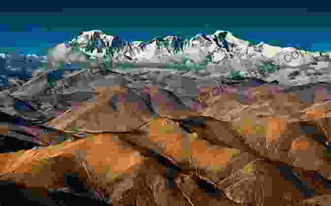 A Stunning View Of The Majestic Mountains Of Tibet, With Snow Capped Peaks Reaching Towards The Sky. To A Mountain In Tibet