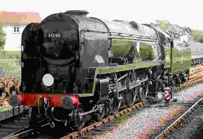 A West Country Locomotive In Classic Black Livery, Pulling A Heavy Freight Train Through A Picturesque Landscape. Oliver Bulleid S Locomotives: Their Design Development (Locomotive Portfolio)