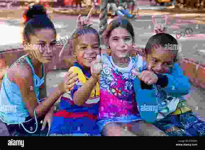 Cuba Dave Interacts With A Group Of Cuban Children, His Face Beaming With Compassion. The Persecution Of Cuba Dave